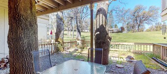 Beautiful home on golf course with fireplace, pool, enclosed patio, W/D, & WiFi