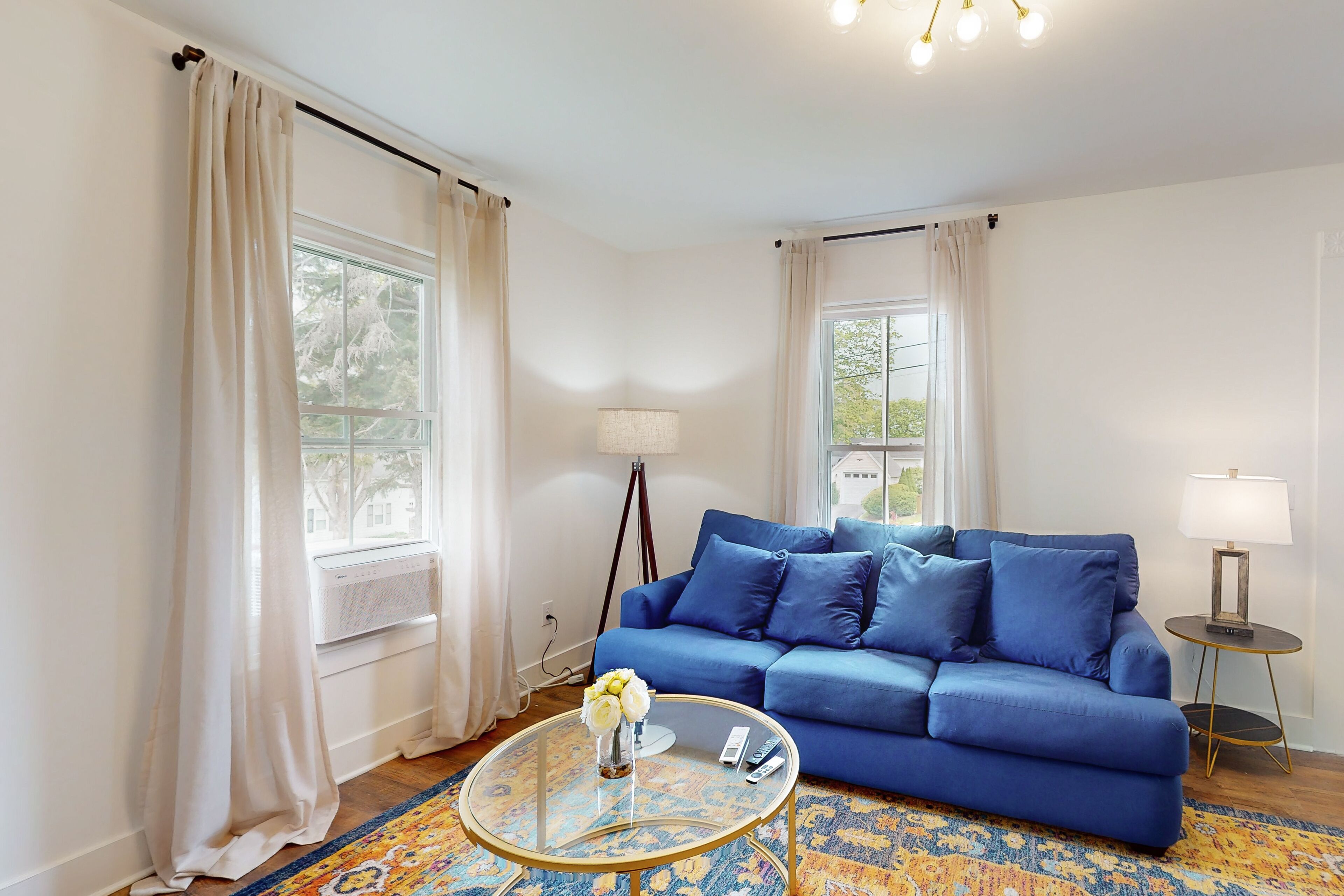 Updated, dog-friendly home with two living areas, firepit, washer/dryer, & patio