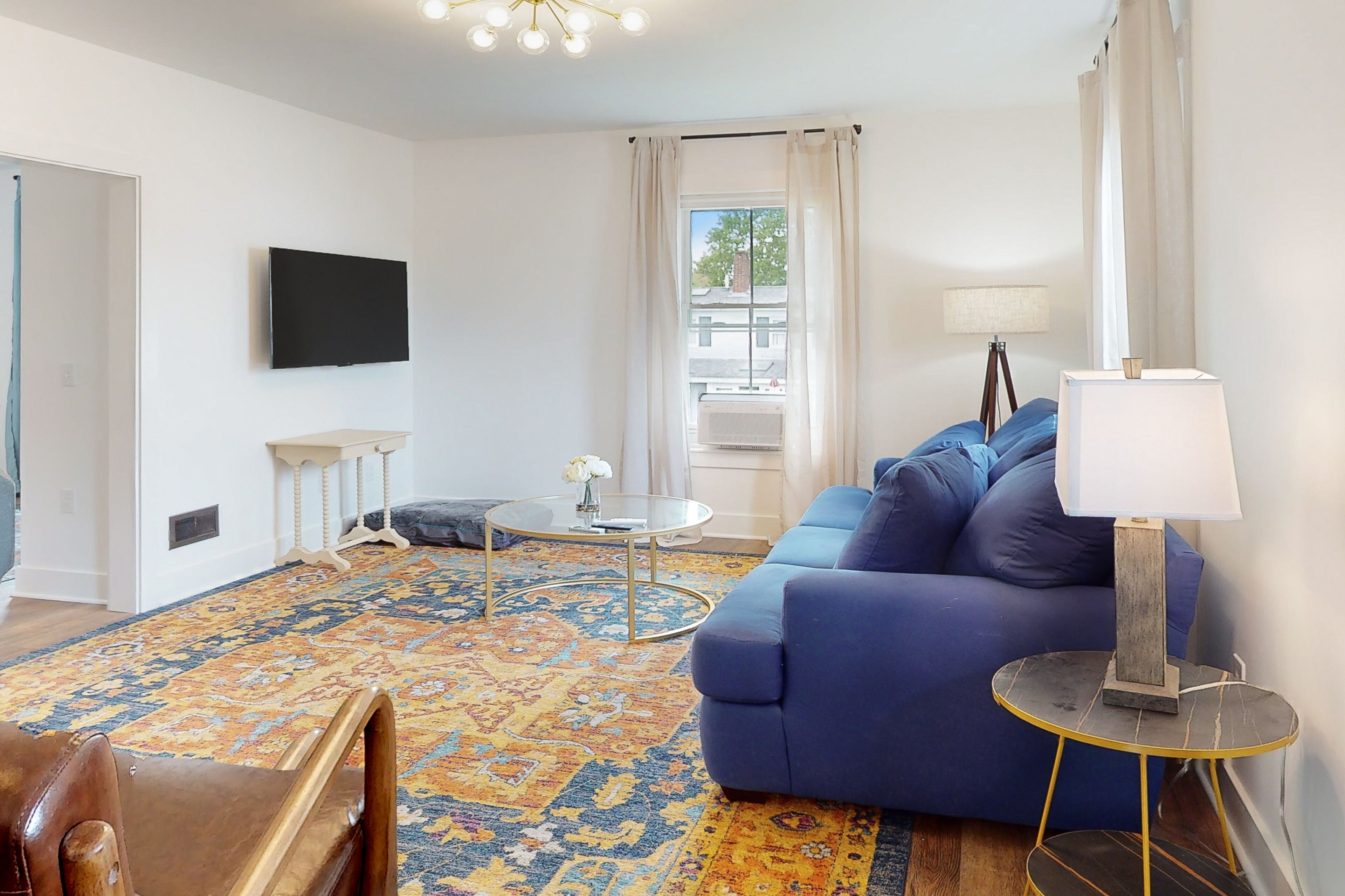 Updated, dog-friendly home with two living areas, firepit, washer/dryer, & patio