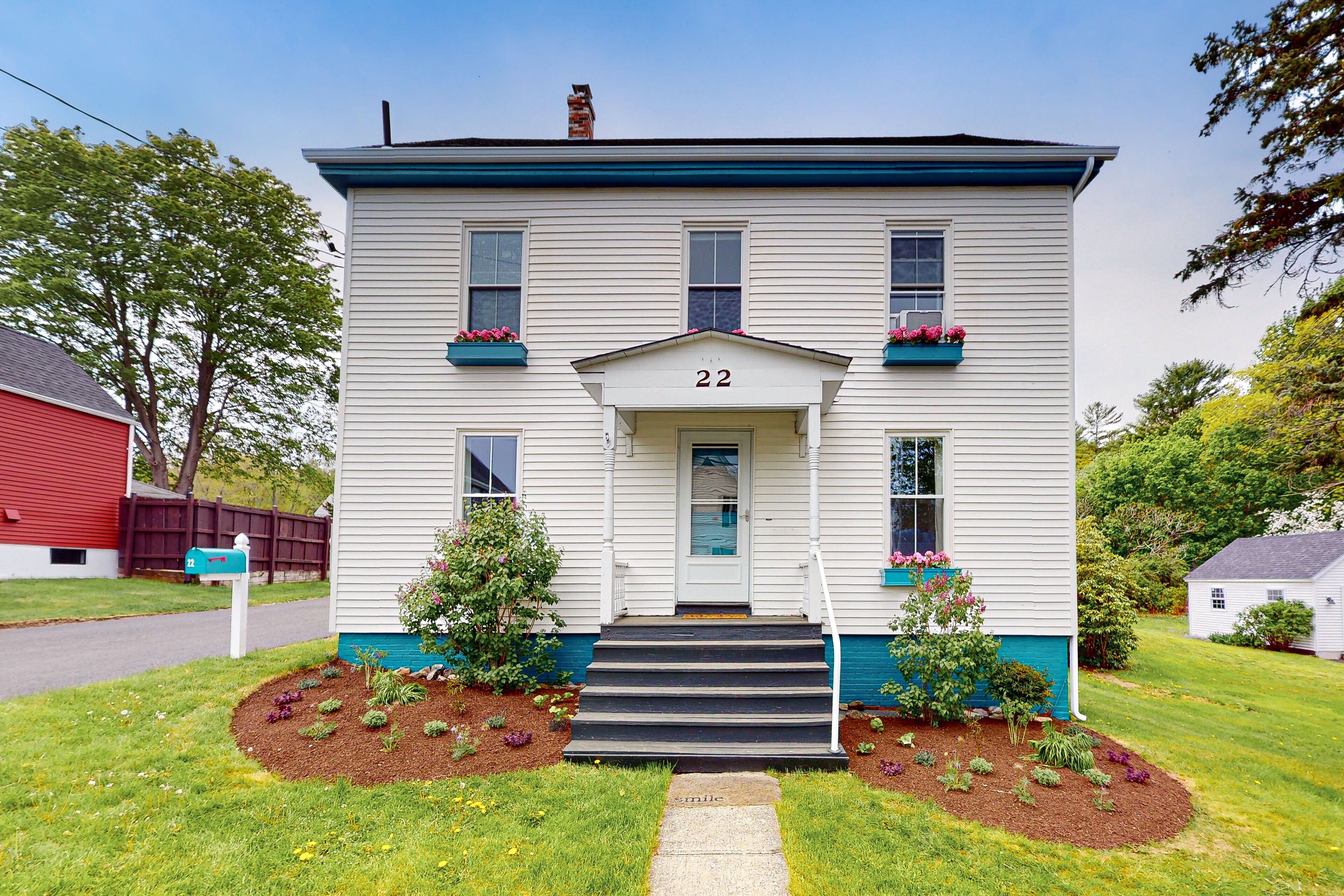 Updated, dog-friendly home with two living areas, firepit, washer/dryer, & patio