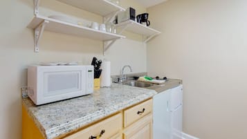Microwave, stovetop, coffee/tea maker, toaster