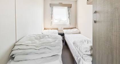Standard economy caravan with one double and two twins.