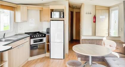 Standard economy caravan with one double and two twins.