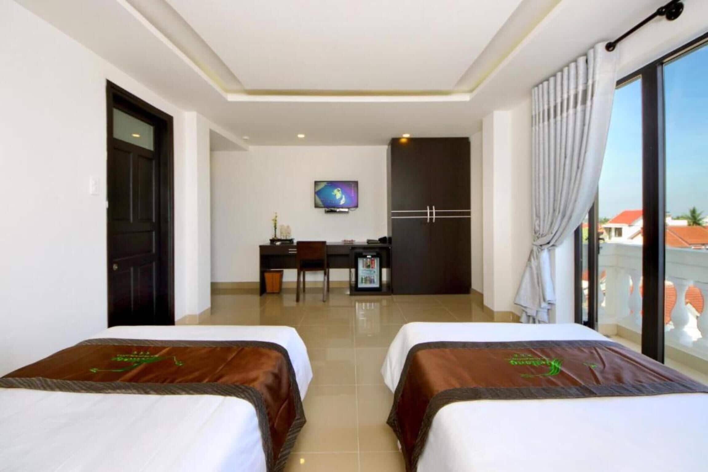 Deluxe Triple Room, Balcony, City View | Egyptian cotton sheets, premium bedding, down comforters, minibar