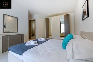 3 bedrooms, desk, iron/ironing board, travel cot