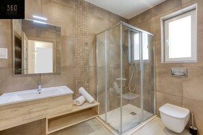 Hair dryer, towels, soap, toilet paper