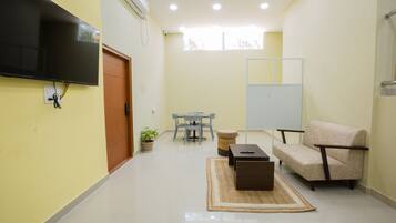 32-inch flat-screen TV with digital channels, TV