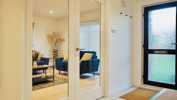 Comfort House, 3 Bedrooms, Accessible, Garden View | Living area | 60-inch Smart TV with cable channels, TV, Netflix