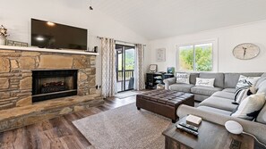Smart TV, fireplace, DVD player, books