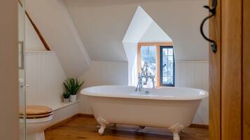 Bathtub, hair dryer, towels