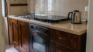 Departamento básico | Cocina privada | Refrigerador con congelador, horno, lavavajillas y cafetera de espresso