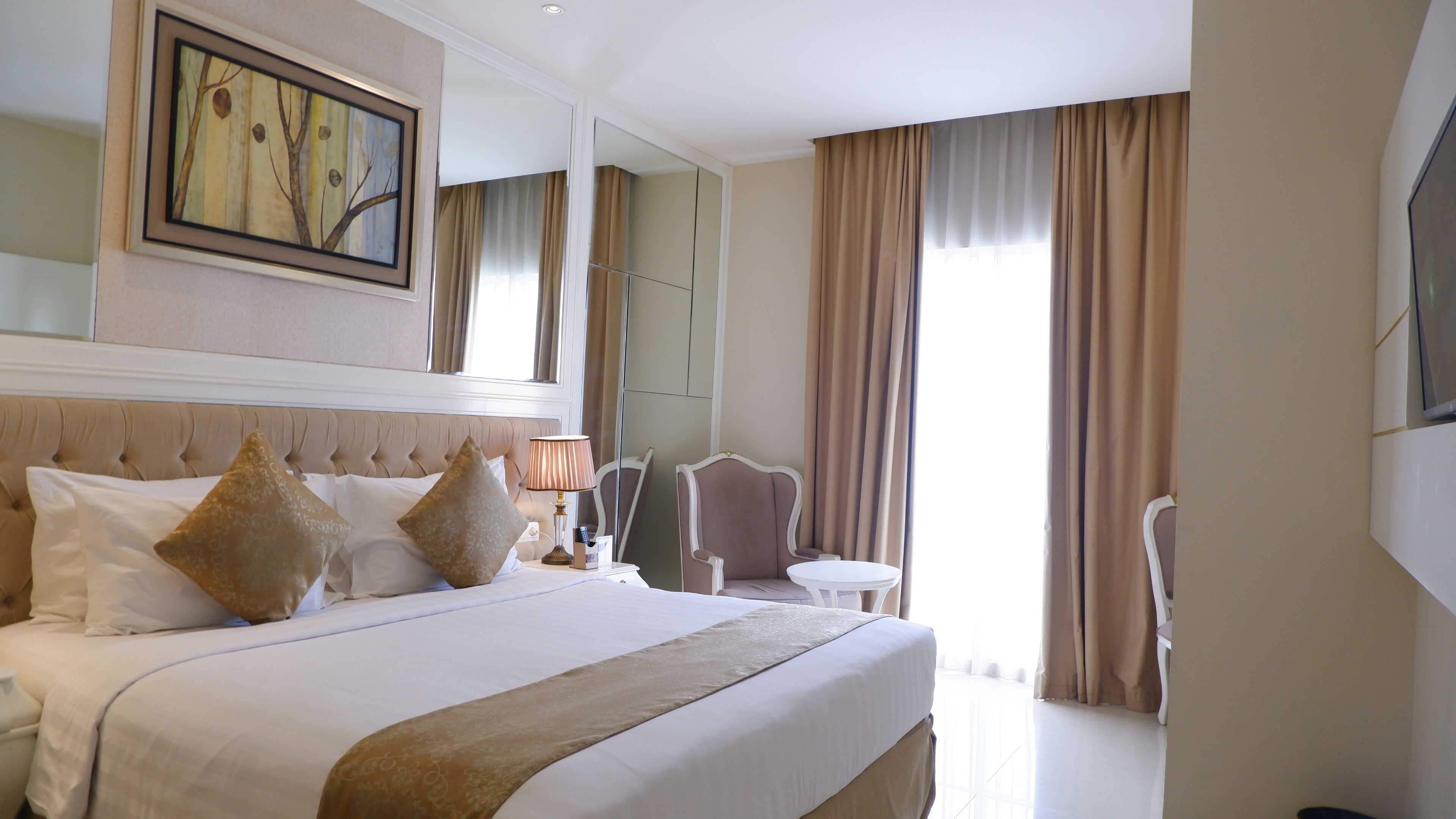 Habitación Deluxe | Baño | Zapatillas y toallas