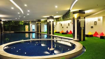 Indoor pool, open 7:00 AM to 7:00 PM, lifeguards on site