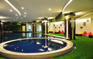 Indoor pool, open 7:00 AM to 7:00 PM, lifeguards on site