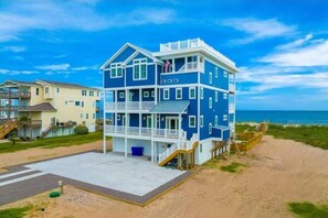 Enjoy stunning ocean views from the property's spacious balconies and relax in the covered outdoor area.