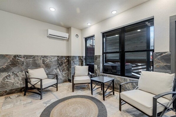 Relax in style with comfortable seating and a sleek, modern design.