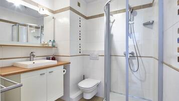 Hair dryer, towels, soap, shampoo