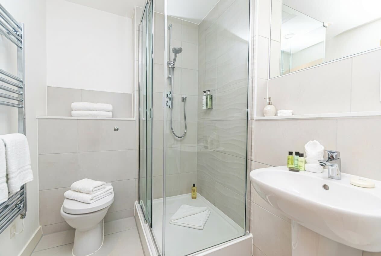 Bathtub, hair dryer, towels