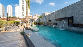 Outdoor pool, open 9:00 AM to 10:00 PM, sun loungers