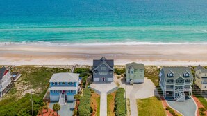 A coastal residential area with houses, a beach, and the ocean. - Topsail Escape | Ocean Views + Gorgeous Property! (North Topsail Beach)
