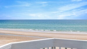 A beach with clear skies and calm waters. - Topsail Escape | Ocean Views + Gorgeous Property! (North Topsail Beach)