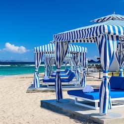 On the beach, sun loungers, beach umbrellas, beach towels