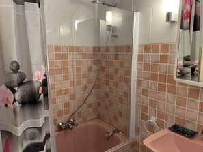 Jetted bath, hair dryer, soap, shampoo