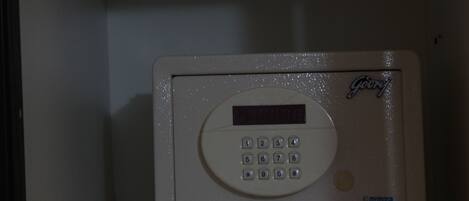 A Goodyear Escada microwave oven with a digital display and keypad.
