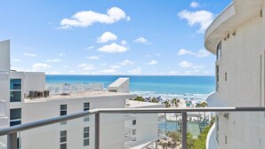A balcony with a view of the beach and ocean. - Beautiful Gulf View, Private Beach Access, Fitness Room (Siesta Key)