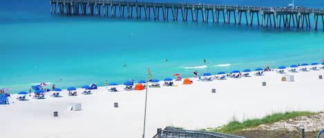 On the beach, sun loungers