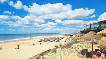 On the beach, sun loungers