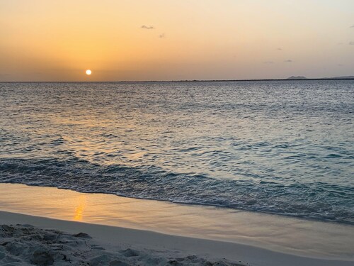 Private condo, water views, great breezes, well appointed for divers