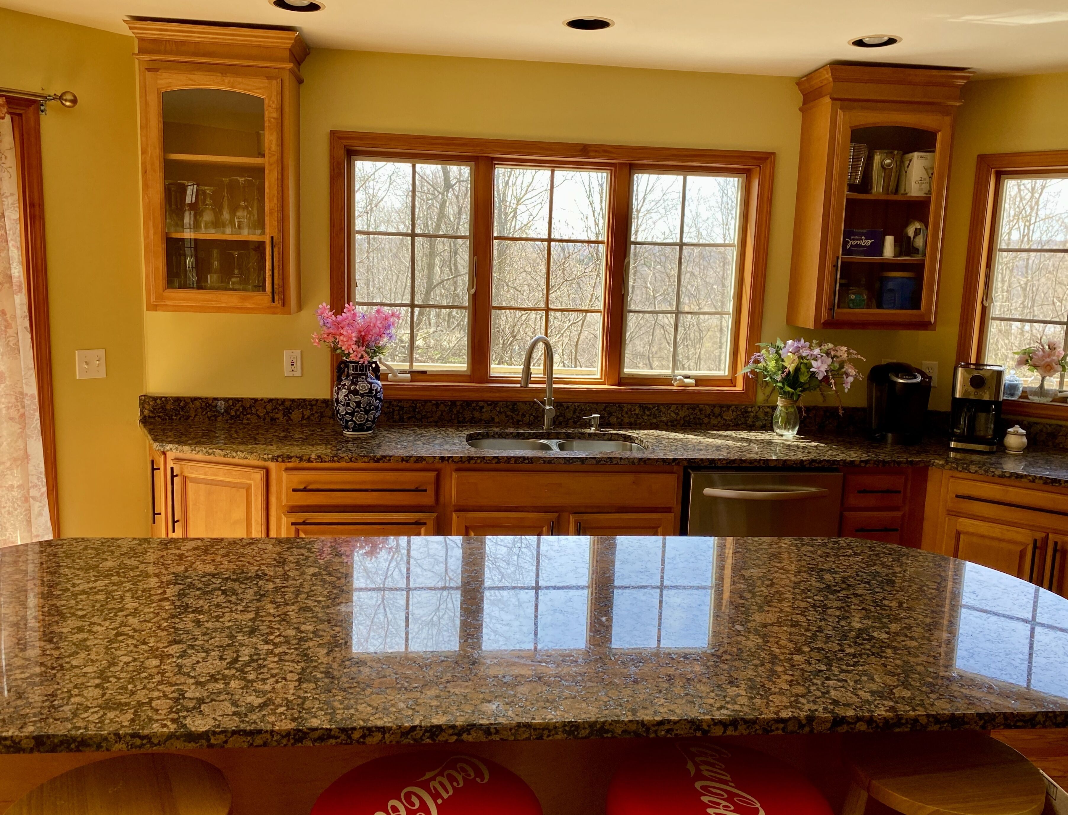 Sunny home sitting among the beautiful woods in Hyde Park, NY.