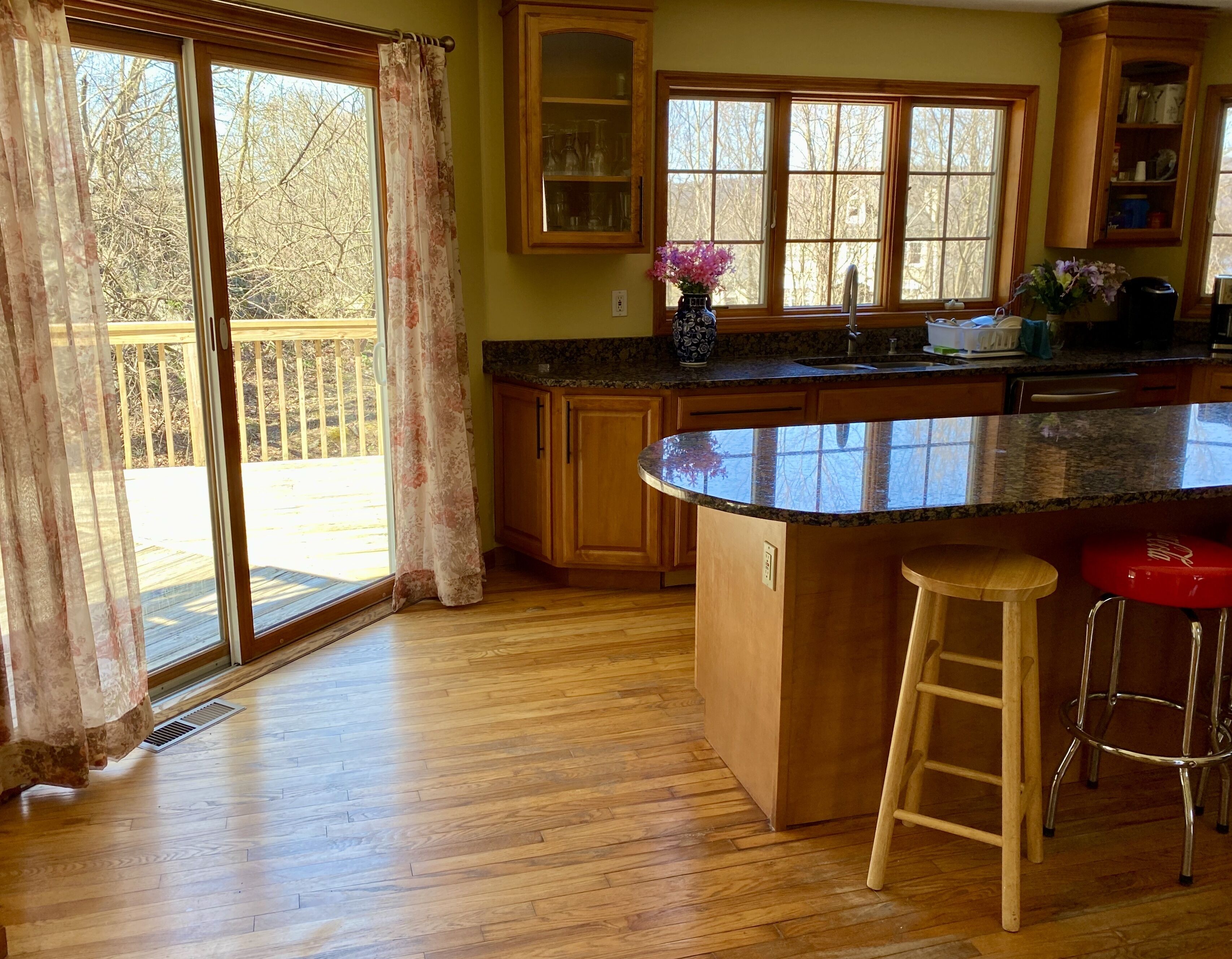 Sunny home sitting among the beautiful woods in Hyde Park, NY.