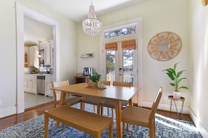The dining room provides a full-size table; plenty of room for meals or games.  - Walk to Beach- Luxury Bungalow, King & Queen Beds, Sleeps 6 (Galveston)