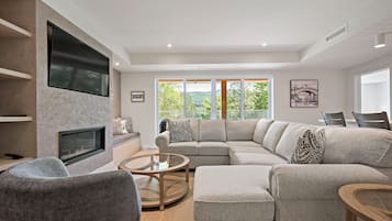 Lago 211 - Le Courmayeu | Living area | 40-inch flat-screen TV with digital channels, TV, fireplace