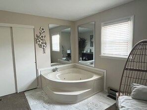 Jetted bath, hair dryer, towels, soap
