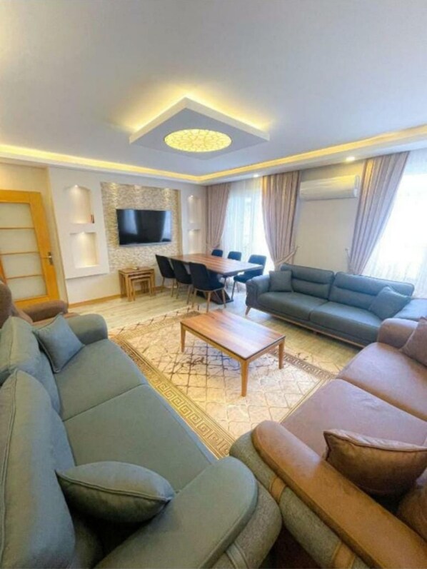 Family Apartment | Living area | 70-cm LCD TV with digital channels