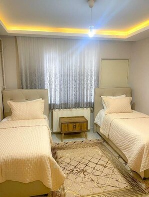 Family Apartment | Iron/ironing board, free cribs/infant beds, free WiFi, bed sheets