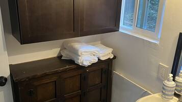 Hair dryer, towels, soap, shampoo