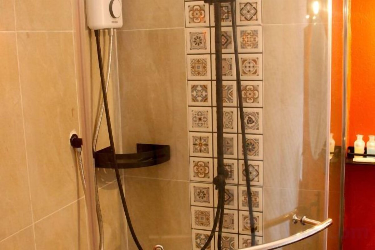Bathroom | Separate tub and shower, rainfall showerhead, free toiletries