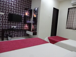 Chambre triple Deluxe | Accès au Wi-Fi (inclus), literie fournie