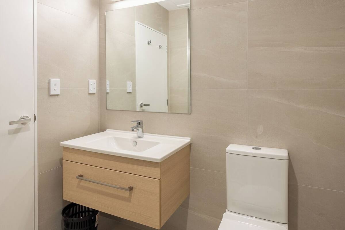 shower, rainfall showerhead, hair dryer, towels