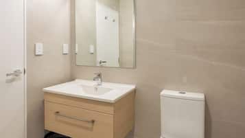 Shower, rainfall showerhead, hair dryer, towels