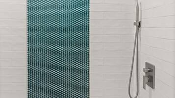 Shower, hair dryer, towels, shampoo