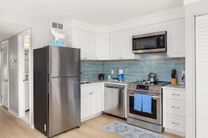 Fridge, oven, stovetop, coffee/tea maker