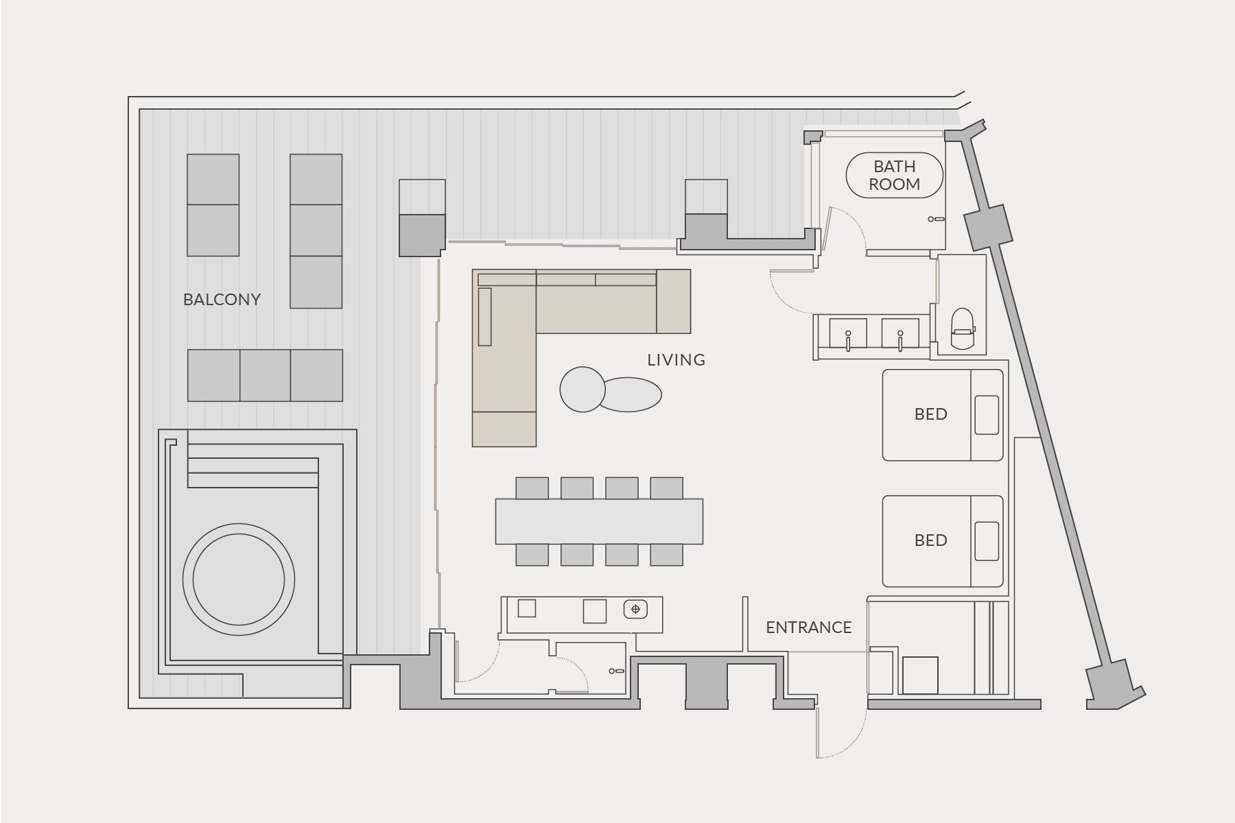 A floor plan of a hotel with a balcony, living area, bathroom, and two bedrooms.