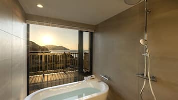 Rooftop Jaccuzi Suite,Non Smoking | Bathroom | Separate tub and shower, deep soaking tub, free toiletries, hair dryer