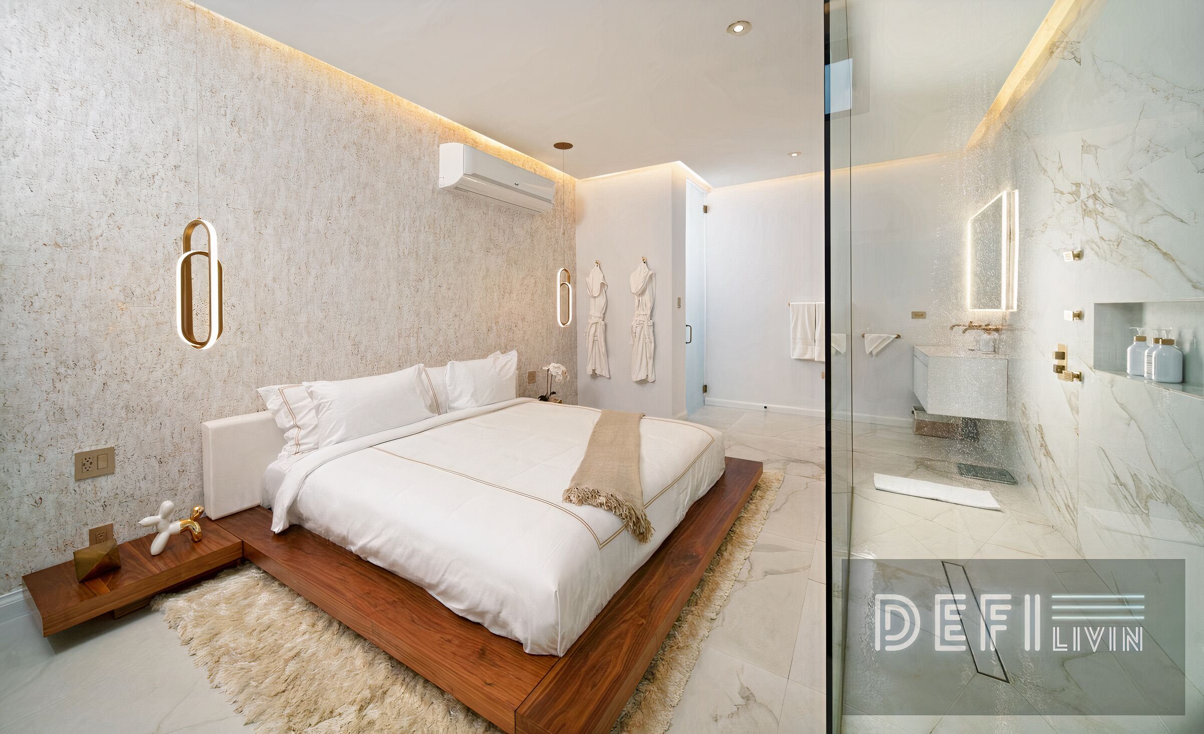 A modern bedroom with a large bed, a wooden bedside table, a fluffy rug, and a glass shower enclosure.