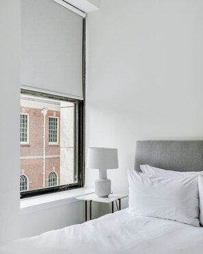 1 bedroom, desk, iron/ironing board, travel crib